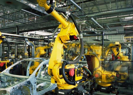 Motion control gear box used in a robotic assembly line application