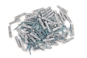 A pile of metal screws mixed in with plastic dowels